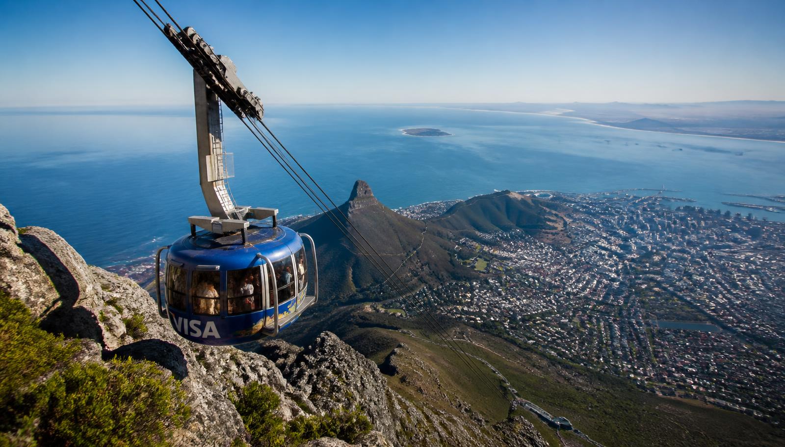 Cable car rising towards Table Mountain above Cape Town, South Africa